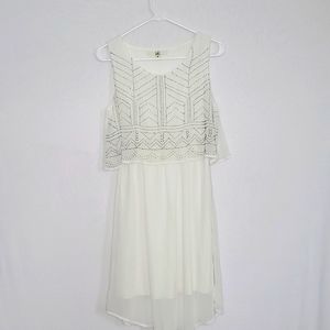 Sheer white dress with beaded detail